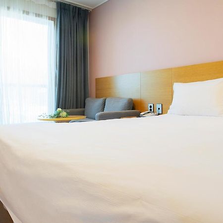 Sims Hotel Чеджудо Экстерьер фото